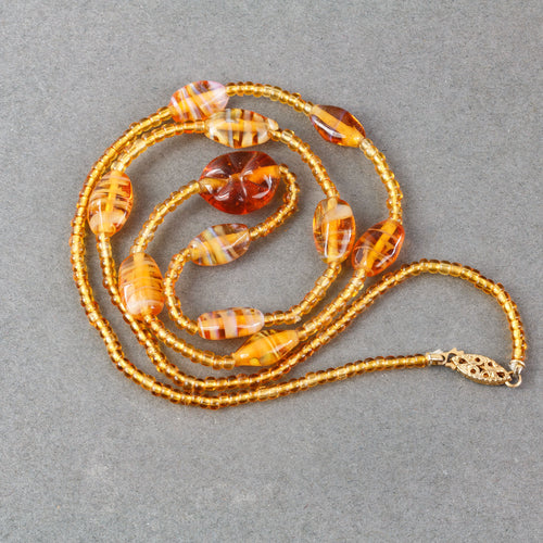 Vintage beaded honey color glass necklace from Czechoslovakia c. 1920s - 30s.  24" long.  j-nlbg2214