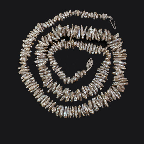 Japanese saltwater Keshi stick pearl necklace. 22".  nlgm005