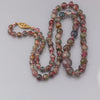 Necklace of vintage faceted natural tourmaline beads. Vermeil clasp. 21.5". j-nlgm007