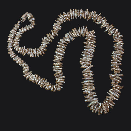 Japanese saltwater Keshi stick pearl necklace. 22".  nlgm005