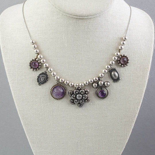 Southwestern Amethyst and sterling silver concho necklace. nlvs751