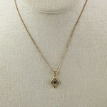 Vintage 14k gold pendant with blue sapphire set in platinum. 10k gold chain. Pdfn127