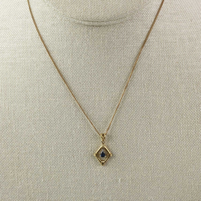 Vintage 14k gold pendant with blue sapphire set in platinum. 10k gold chain. Pdfn127