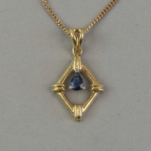 Vintage 14k gold pendant with blue sapphire set in platinum. 10k gold chain. Pdfn127