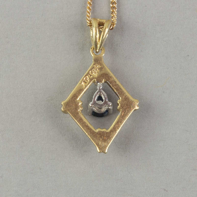 Vintage 14k gold pendant with blue sapphire set in platinum. 10k gold chain. Pdfn127