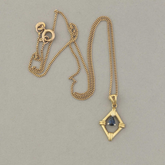 Vintage 14k gold pendant with blue sapphire set in platinum. 10k gold chain. Pdfn127