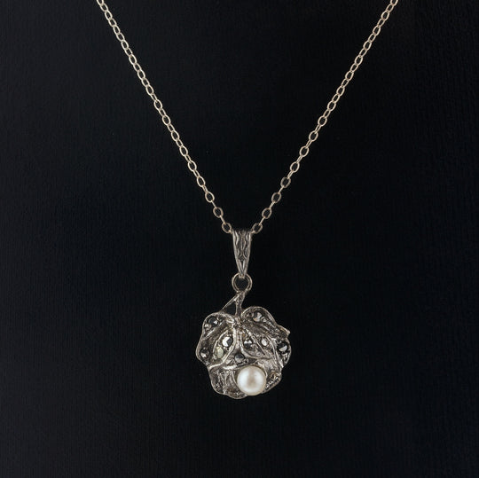 Sterling silver rose pendant with marcasites and pearl.  Germany.  1980s.  pdvs1004