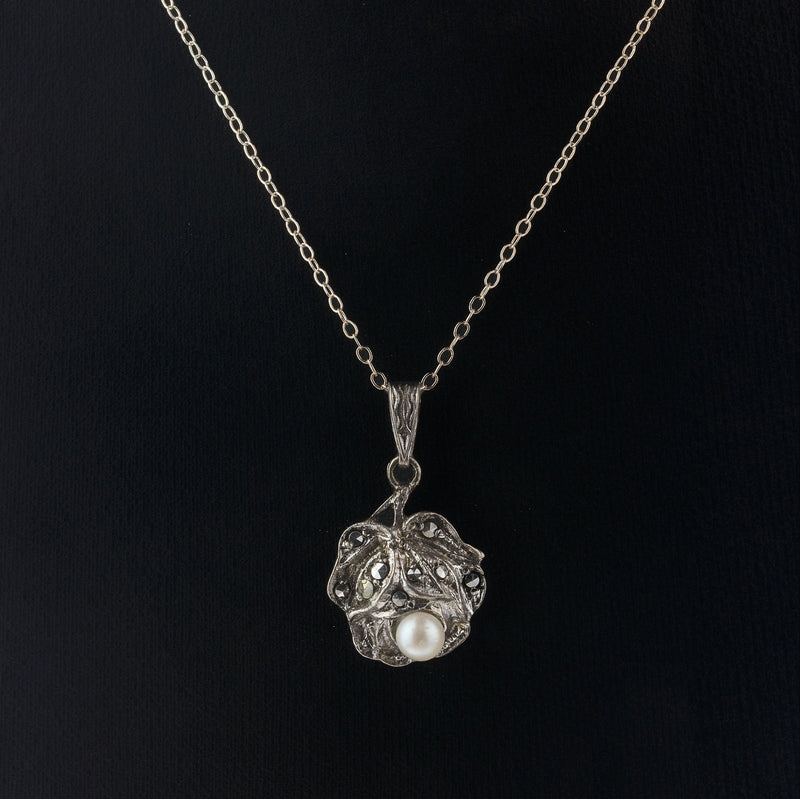 Sterling silver rose pendant with marcasites and pearl.  Germany.  1980s.  pdvs1004