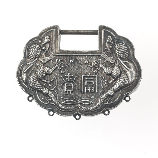 Antique Chinese Qing Dynasty silver repoussé dragon baby lock.  Pdvs1012