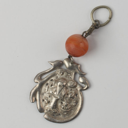 Antique Chinese Qing Dynasty sterling silver and carnelian talisman of ancient deity. pdvs1013