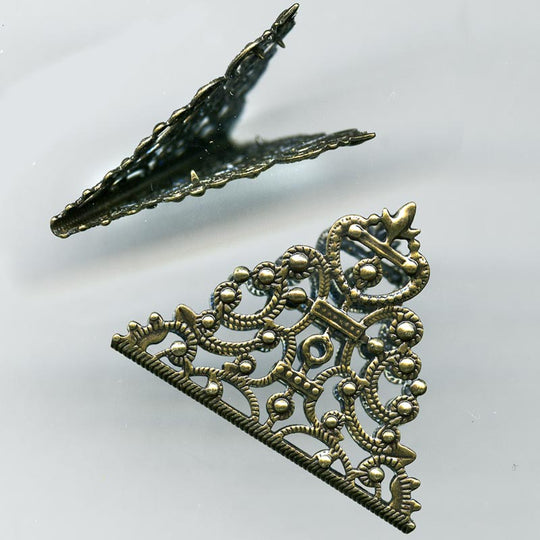 Antiqued brass folded filigree triangle. 35x33mm pkg of 1. b9-0978(e)