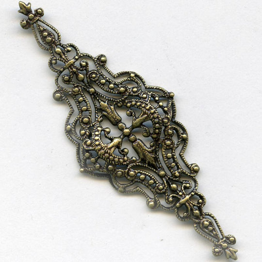 Antiqued brass filigree component. 62x25mm. Pkg of 1. b9-1002