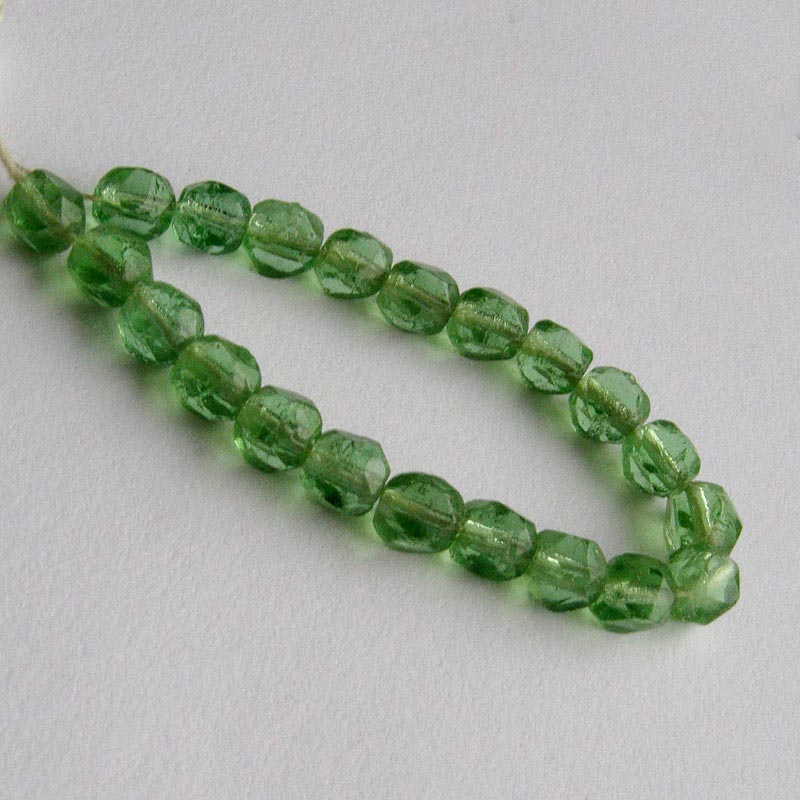 Vintage transparent spring green English cut beads, Czechoslovakia, 5mm, strand of 50.