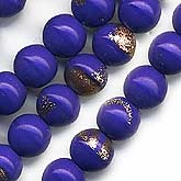 Opaque royal blue glass round with goldstone. 6mm. Pkg. of 10