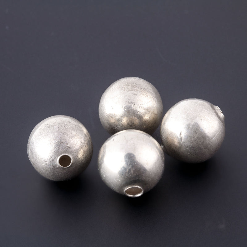 Vintage smooth sterling silver round beads, Mexico. 1940s-50s