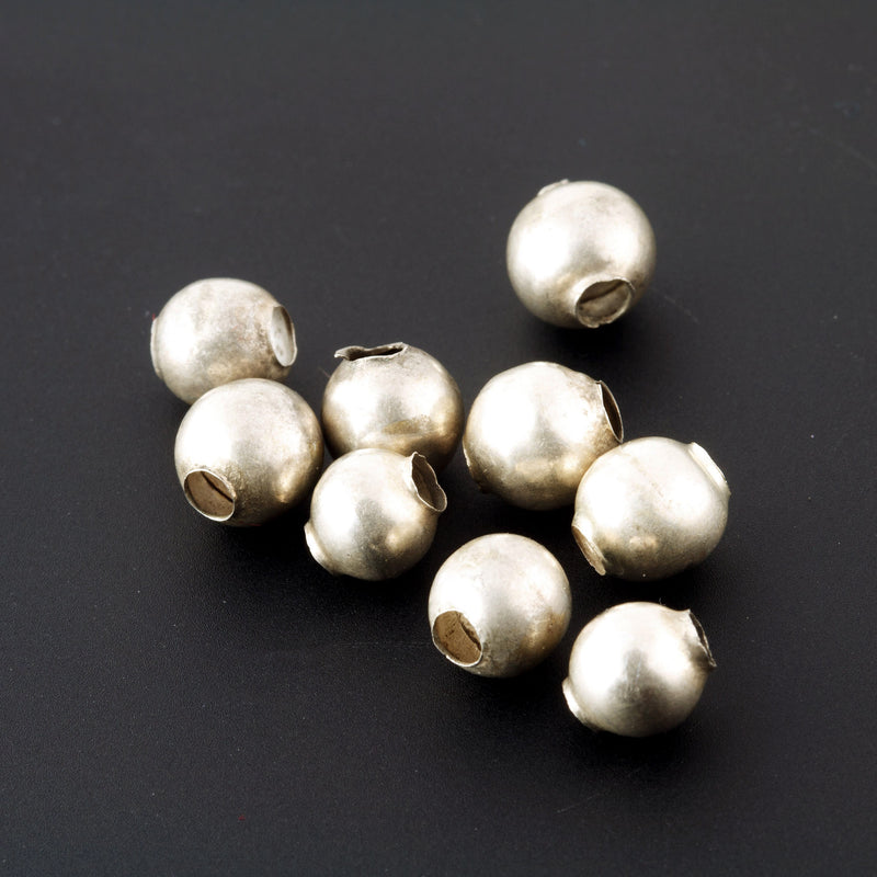 Vintage smooth sterling silver round beads, Mexico. 1940s-50s.