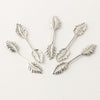 Sterling silver plated fold over bail with leaf design. 35x5mm. Pkg. of 4.
