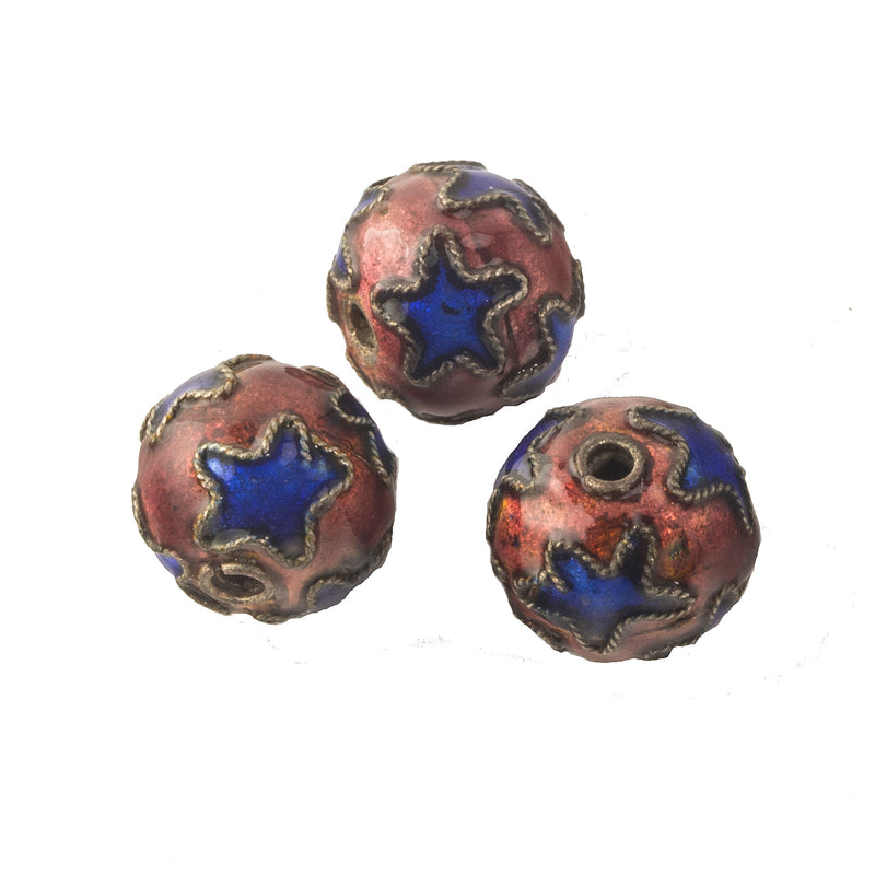 Hollow copper beads with blue stars on persimmon colored enamel. 10mm. Pkg. 2. 