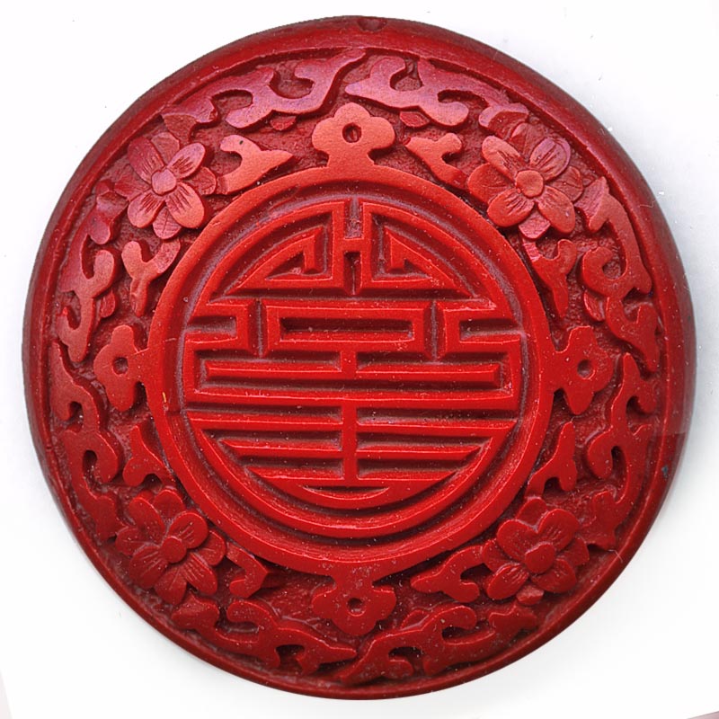 Carved red cinnabar disk. 55mm pkg of 1. B7-CIN017 – Earthly