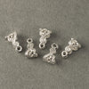 Sterling silver plated brass filigree bail. 13x8mm. Sold individually.