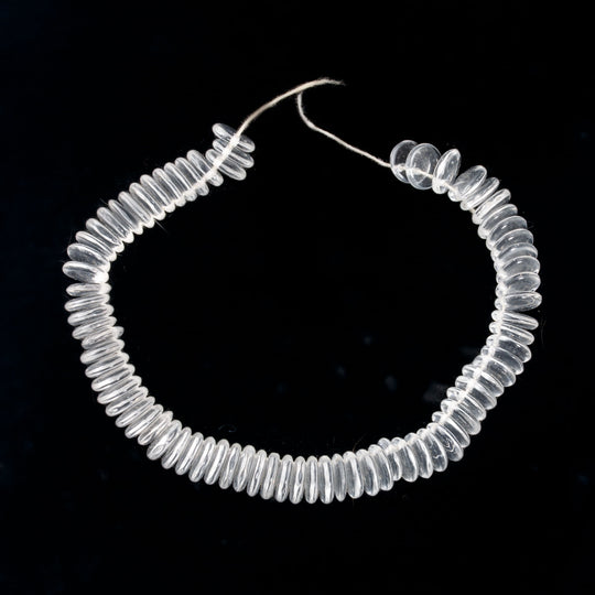 Sequin Pendants Clear Glass. 1920s. Czechoslovakia. 7x2mm. Pkg 50. b11-cr-0505