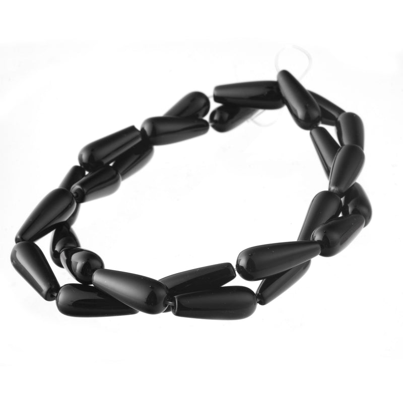 Black Onyx A grade hand cut teardrop beads. 16x6-7mm. Vintage stock, 1980s. 2 matched pairs. 1980s.