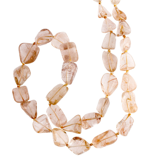 Vintage necklace of graduated and knotted red rutilated quartz large freeform beads. nlbd1133