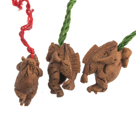 Vintage fruit pit carvings of monkey carrying fish on back.  Set of 3.  B7-wo340