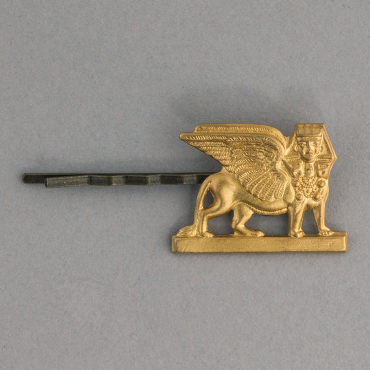 Vintage stamped brass winged lion sphinx in Egyptian revival style hair pin. ac-h-232