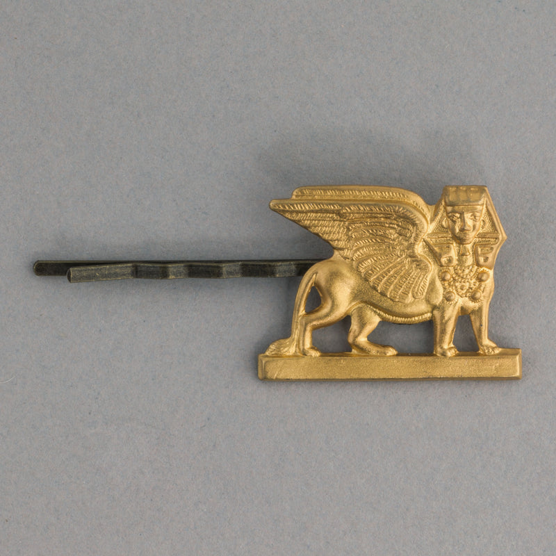 Vintage stamped brass winged lion sphinx in Egyptian revival style hair pin