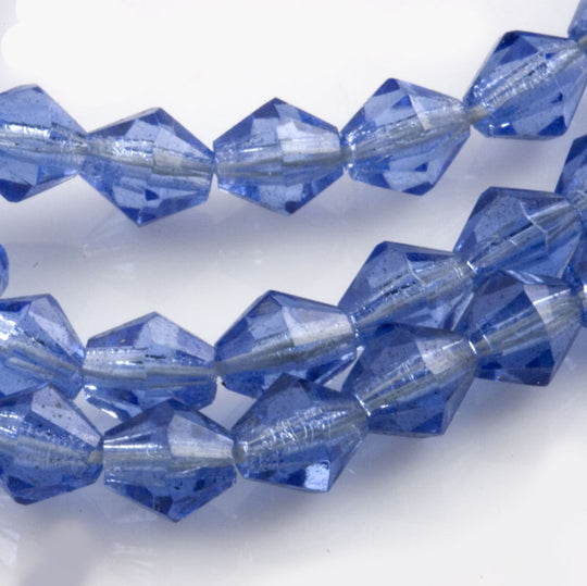 Vintage Austrian machine cut bicones. 5x6mm. Pkg of 25. b11-bl-0981