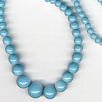 Graduated opaque blue glass 18 inch strand, Occupied Japan. 4-9mm. 