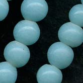 Vintage wire wound robins egg-blue rounds. 4mm. Pkg of 50. 