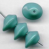 Vintage Czech opaque turquoise blue glass elongated flying saucers. 7x9x11mm. Pkg of 10. 