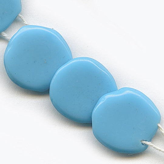 Old French 2 hole overlapping disks 10mm Pkg of 10. b11-bl-2007