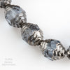 Czech 10 x 8mm Alexandrite  faceted glass oval bead with silvered circular edges. Pkg4.