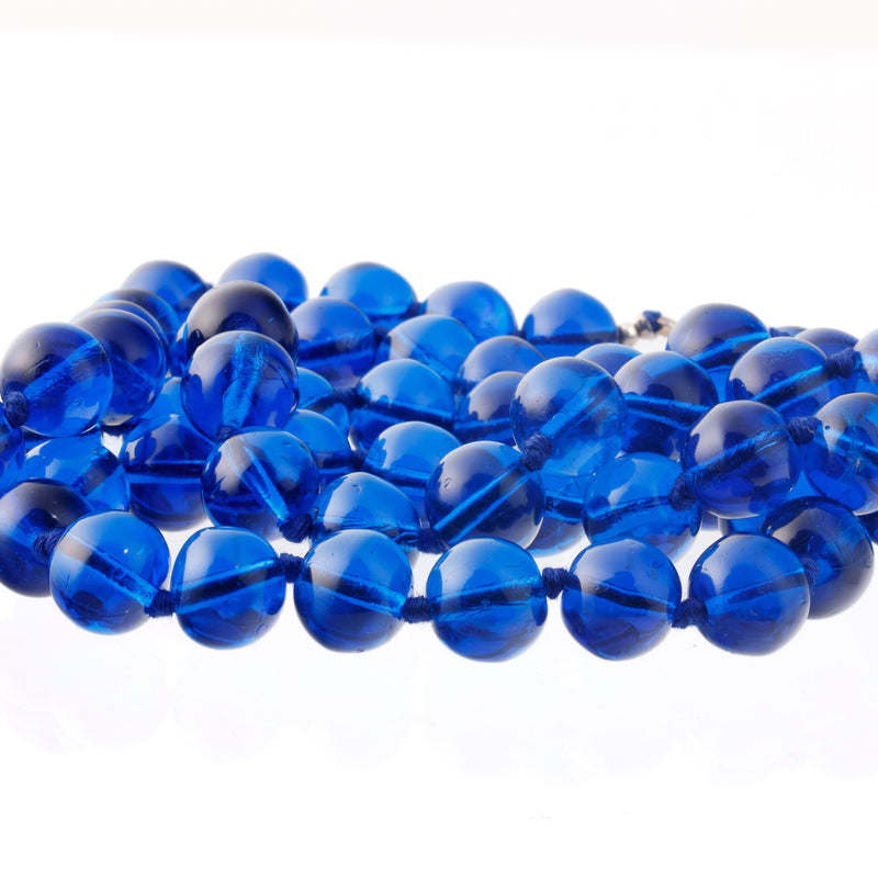 Peacock blue hand wound glass beads.  China, 1980s. Pkg. 4