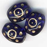 Cobalt Blue Oval with Gold dots bead. 9x7mm. Pkg of 10. b11-bl-0767