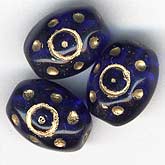 Cobalt Blue Oval with Gold dots bead. 9x7mm. Pkg of 10. 