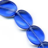 Sapphire blue glass oval beads. 12x9mm. Pkg of 10.