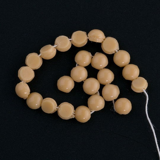 Antique opaque tan glass nailheads. 4mm. 1 hank of 12 strands. 300 beads.  b11-br-0712