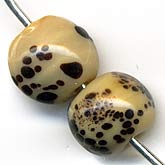 b11-br-0701-Vintage speckled rounds. 10x8mm. Pkg of 10