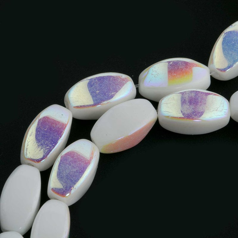 West German oval shaped glass bead with AB Finish. 11mm x 6 mm, Pkg of 10.