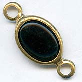 Vintage jet glass cabochon in 2 ring brass channel. 25x12mm. Pkg of 2.