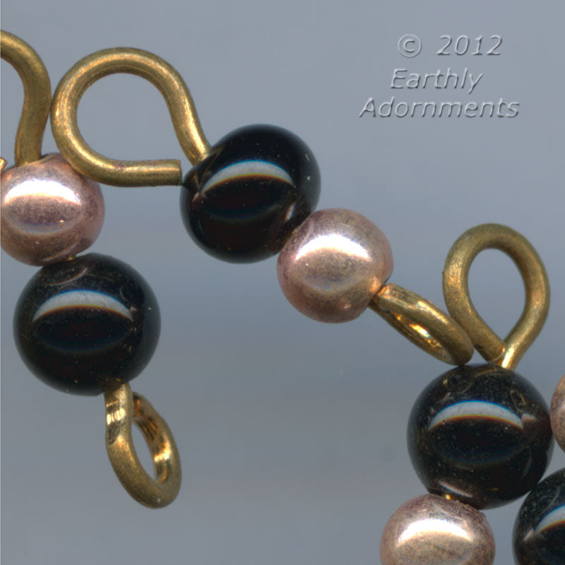 Vintage wired links of black glass and copper beads, Japan 14x4mm, package of 25. 