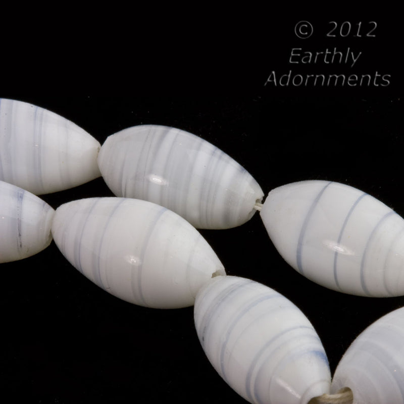 Vintage white opal lampwork oval glass beads with clear striations. Pkg. of 4. 