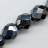 Vintage West German hematite glass faceted rounds. 8x7mm. Pkg of 10.