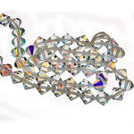 Vintage Czech tin-cut 10mm crystal glass aurora borealis bicones. Pkg. of 10.