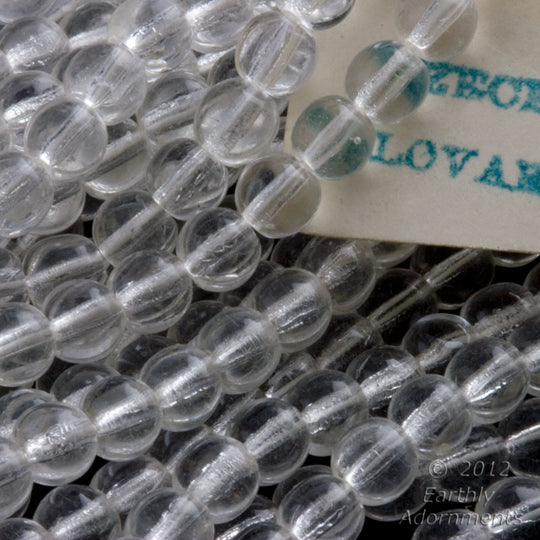 Vintage 4mm clear glass smooth rounds, 4mm. Czechoslovakia, strand of 50. B11-CR-0870