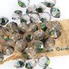 Vintage West German clear faceted bicone with vitrail finish. 6mm. Pkg of 20.